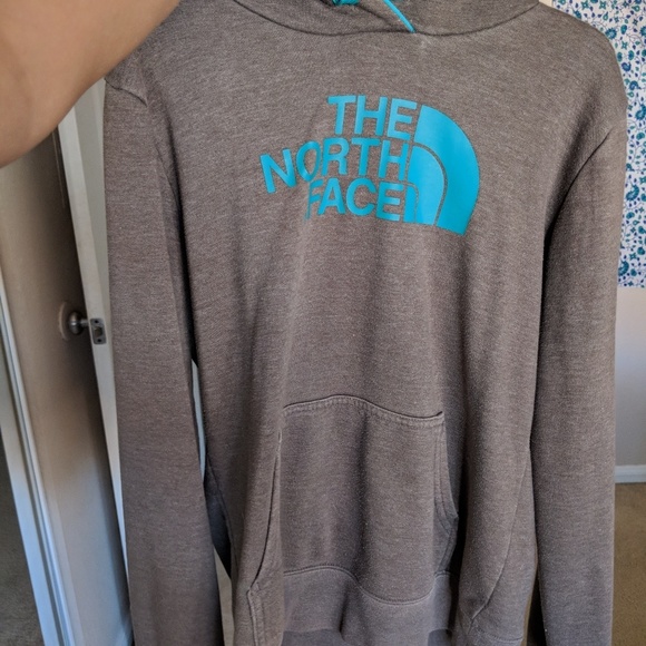 grey and blue north face hoodie